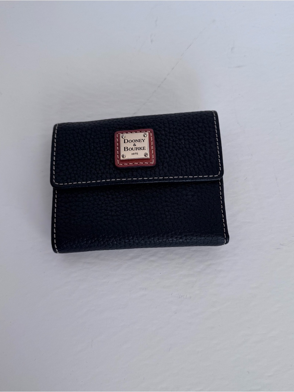 Dooney & Bourke Black Pebbled Leather Small Wallet with Red Logo Accent